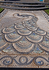 A good example of a traditional Peacock design in pebble mosaic used in a garden terrace