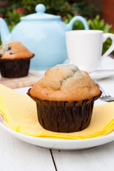 Blueberry muffins with afternoon tea in the garden