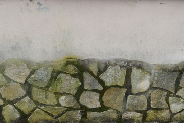 Detail of a wall covered with stone