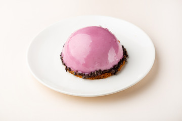 Pink dessert on plate