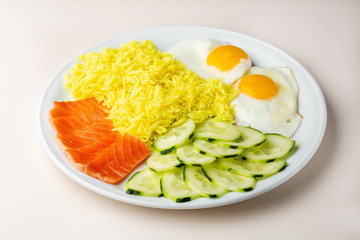 Breakfast plate with rice and eggs