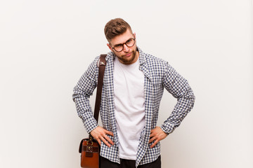 Young modern business man scolding someone very angry.