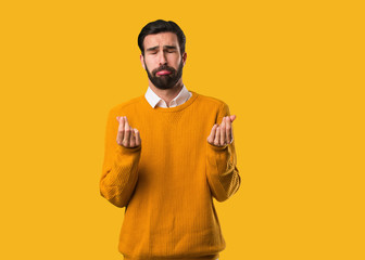 Young natural man doing a gesture of need