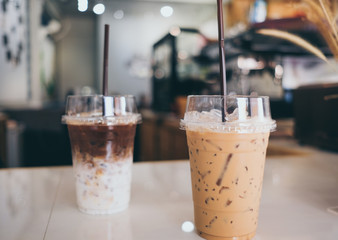 Closeup coffee cups in a cafe with espresso machine