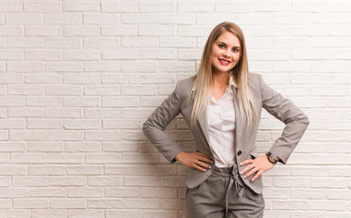 Young russian business woman with hands on hips