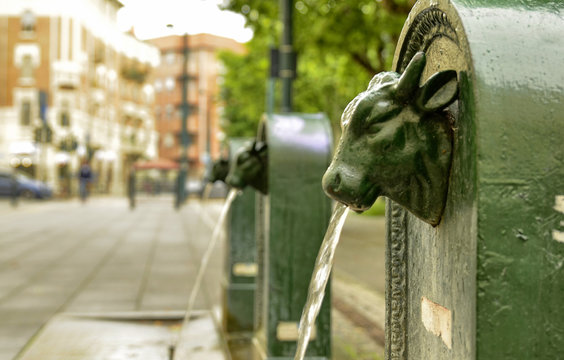 A triptych of drinking water fountains