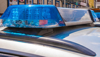 Closeup from the modern emergency light of a German police car.