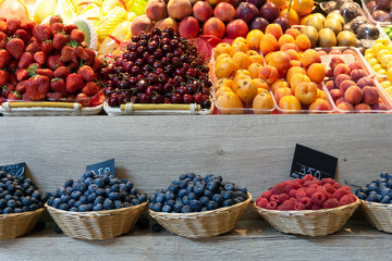 Summer fruits, vegetables and berries on the market.