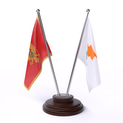 Montenegro and Cyprus, two table flags isolated on white background. 3d image
