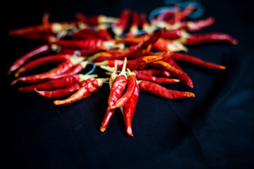 Red hot pepper on a black background