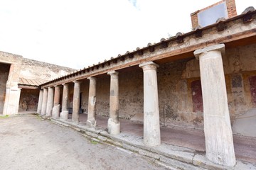 Naklejka premium Ancient Buildings with Roman Pillars in Pompeii, Italy