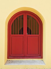 door in red wall