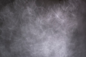 Naklejka premium Gray chaotic smoky swirls