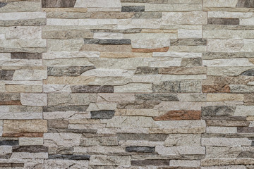 Artificial stone texture background, pattern of decorative slate stone wall surface