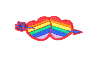 Rainbow hearts with arrow on white background