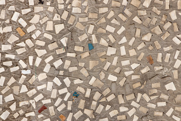 Mosaic on the wall of small fragments of stones