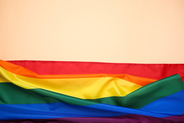 Rainbow flag on beige background