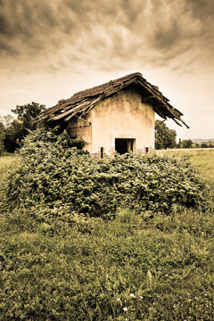 Old abandoned farm structures of the 19th century -toned image