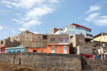Fototapeta na wymiar Houses under construction in Praia, Santiago, Cape Verde, Cabo Verde, African neighborhood.