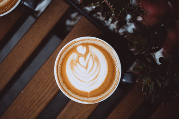 Grey cup of cappuccino