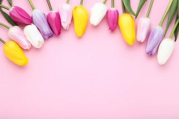 Bouquet of tulip flowers on pink background