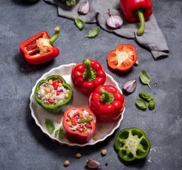 Stuffed vegetarian peppers or paprika with rice and chickpeas, vegan cooking, healthy summer lunch