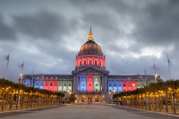 San Francisco City Hall lit in Red, Green, Blue, and Yellow for the Eritrean Independence Day. San Francisco, California, USA.