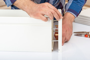 The buyer collects ready-to-assemble folding table. Ready-to-assemble furniture