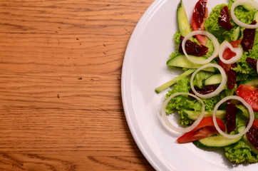 Salad baked eggplant and fresh tomatoes. Top view
