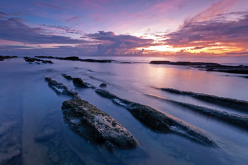 Sunrise with rocky foreground, Bak Bak beach in Kudat, Sabah Malaysia