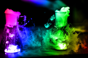 Glass flasks with chemical reaction
