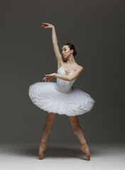 Young beautiful ballerina is posing in studio © Alexander Y