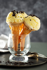 Ice cream cones in glass jar. Summer foods, vanilla ice cream dessert.