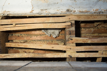 Detail of lath and plaster on an old wall