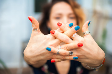 Hands mantra close up and copy space. Girl practicing yoga on the veranda. Woman in yoga asanas in...