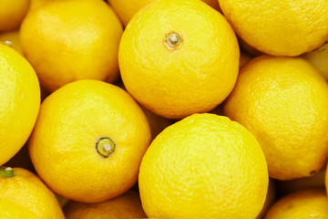 Citrus yellow fresh lemon close-up by group