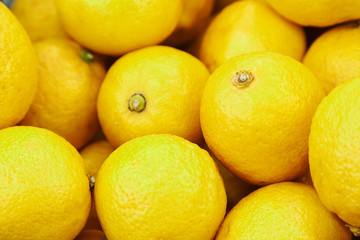 Citrus yellow fresh lemon close-up by group