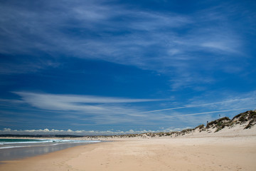 Fototapeta na wymiar beautiful beach with blue sky in Peniche, Portugal