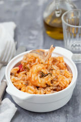 traditional portuguese dish rice with seafood in white dish