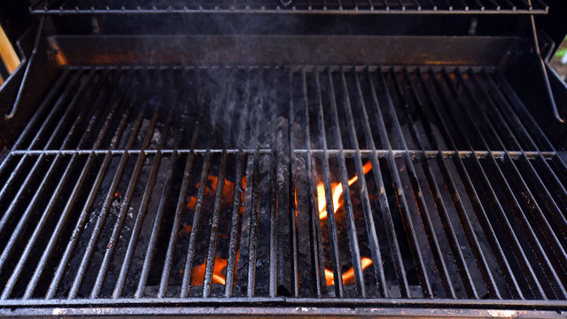 Barbecue grill with flames