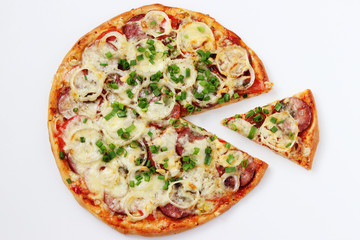 Homemade pizza with mozzarella and salami on a white background, top view, a slice of pizza cut