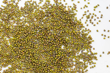 Mash (mung beans) on a white table. Background of mung beans, horizontal orientation