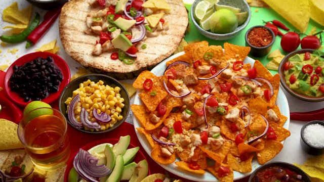Various freshly made Mexican foods assortment. Placed on colorful table