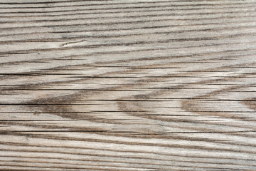 Fototapeta premium texture of old faded cracked wood, worn wood panel, close up abstraction background