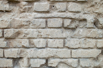 Old cracked bricks seamless texture