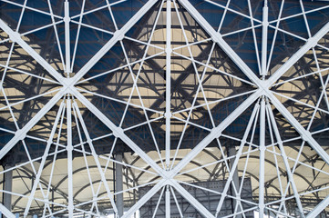 Fragment of wall and roof of football stadium. Abstract Modern Construction. Structure of steel wall and roof.