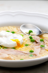 still life of poultry soup with egg