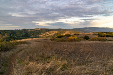 Fototapeta na wymiar Sunset on silicon valley as seen from the top of Monte Bello open space above Palo Alto, California