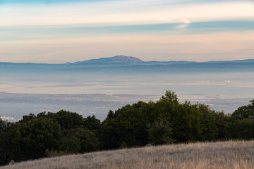 Sunset on silicon valley as seen from the top of Monte Bello open space above Palo Alto, California