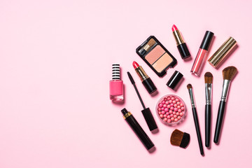 Obraz na płótnie Canvas Makeup professional cosmetics on pink background.
